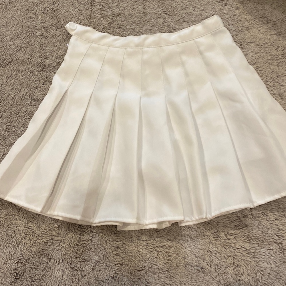 White pleated skirt